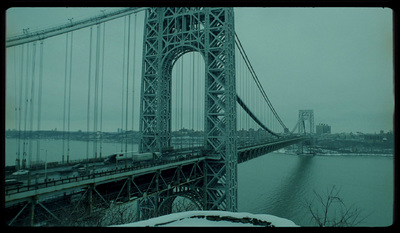 a view of a bridge over a body of water