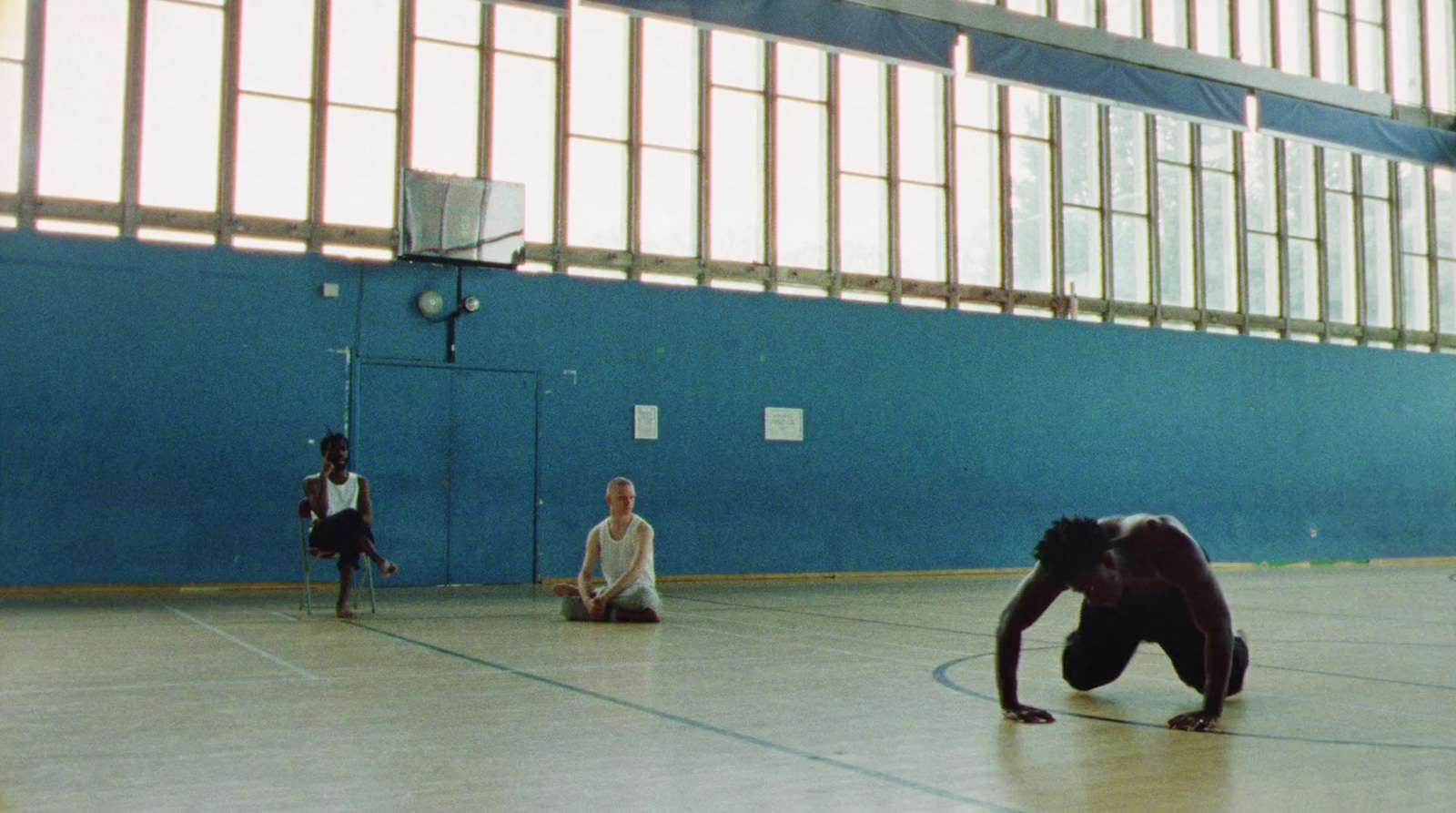 a group of people playing a game of basketball