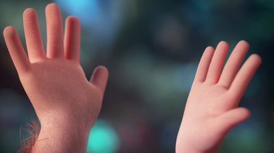 a close up of a person's hands with a blurry background