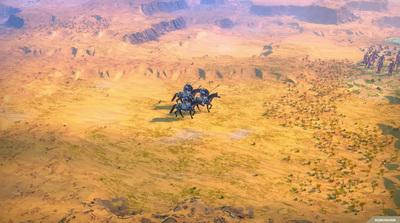 a group of people riding horses across a desert