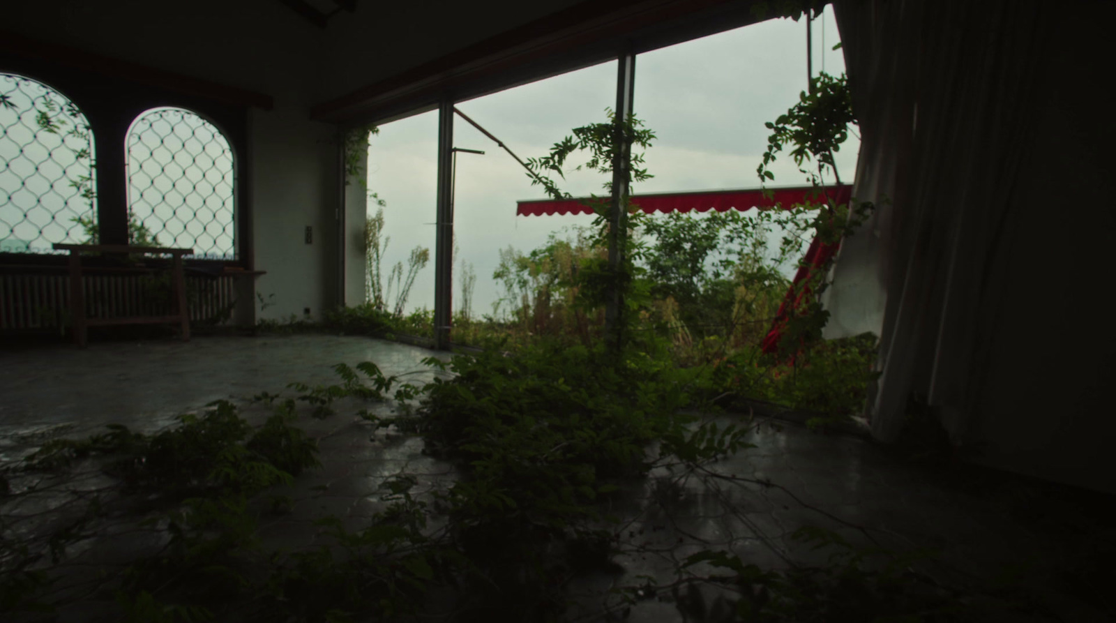 a room with a view of a body of water