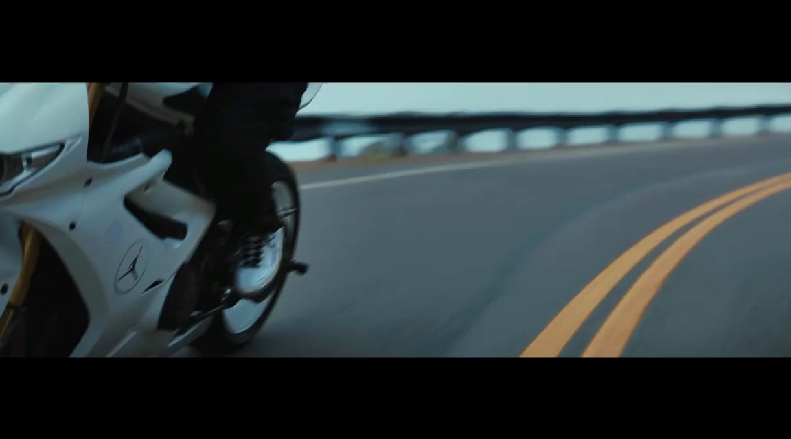 a close up of a motorcycle on a road