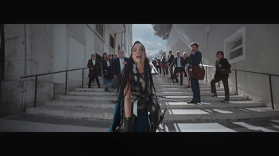 a group of people walking down a set of stairs