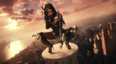 a woman in a futuristic suit sitting on top of a building