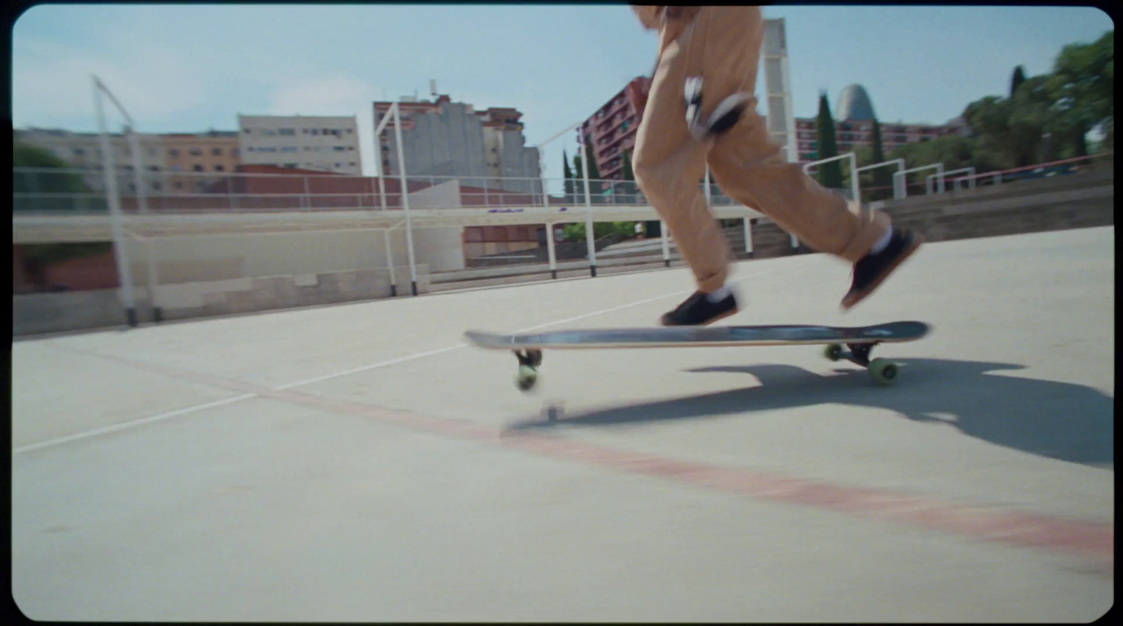 a person riding a skateboard on a city street