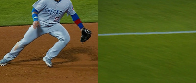 a baseball player standing on top of a field