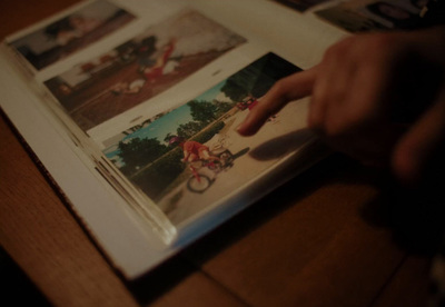 a person holding a mouse over a book