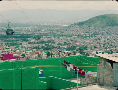 a view of a city from a hill