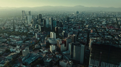 an aerial view of a city with tall buildings