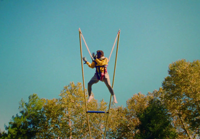 a man on a pair of skis in the air