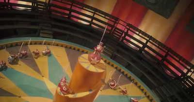 an aerial view of a carnival ride at night