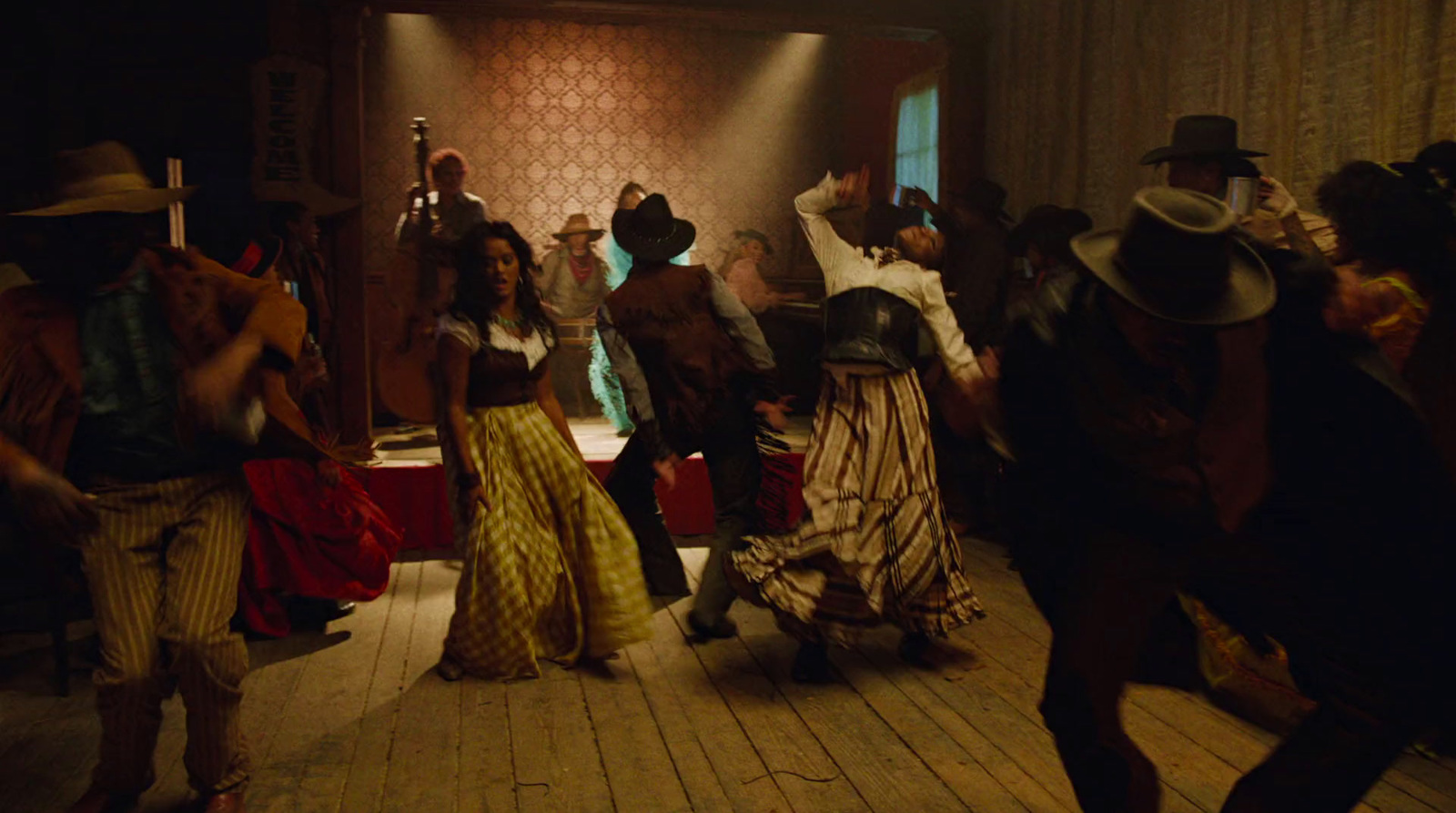 a group of people dancing in a room