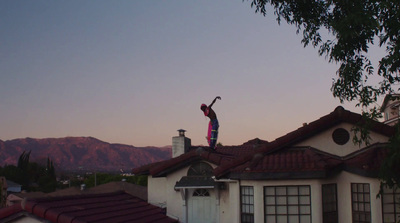 a person standing on top of a roof