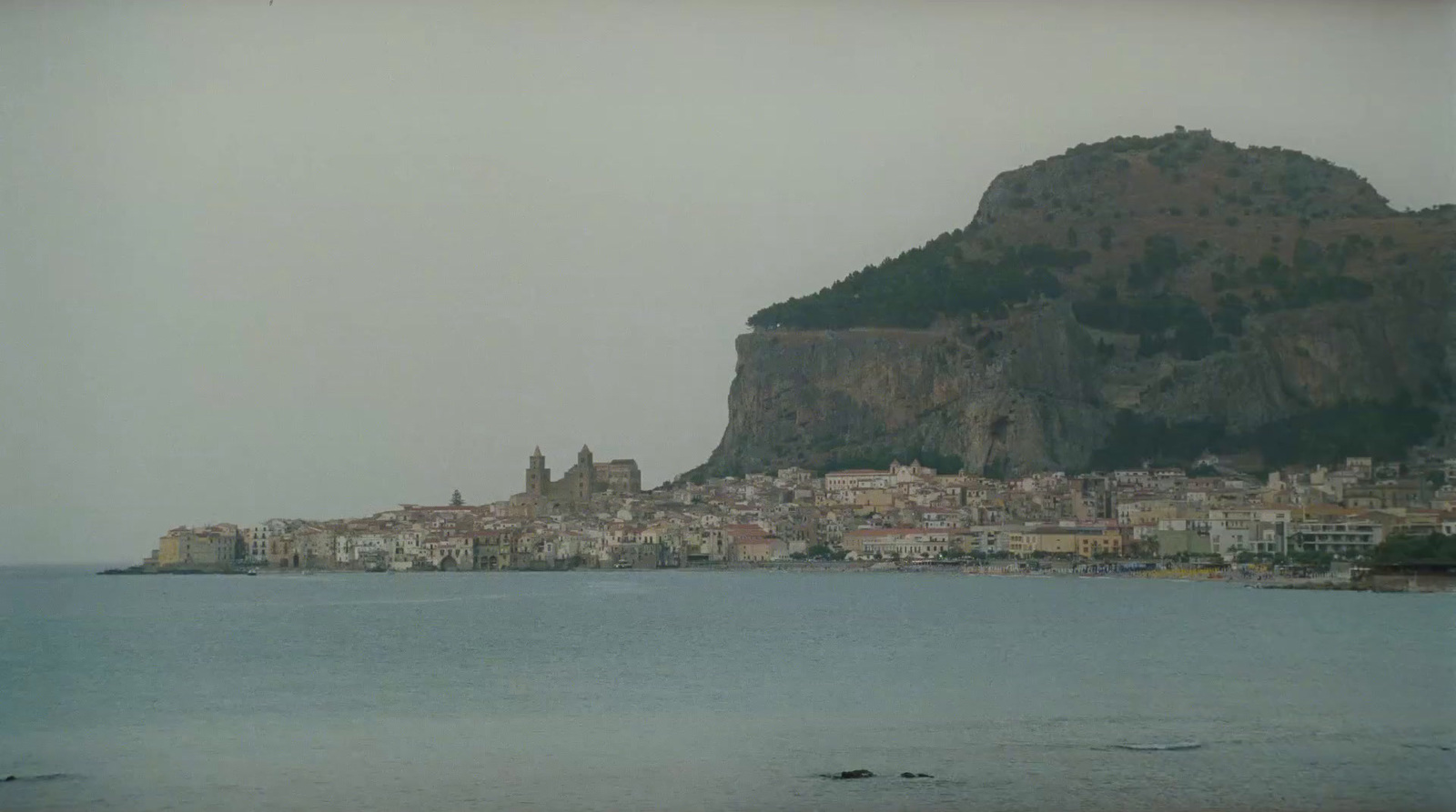 a large body of water with a city on top of it