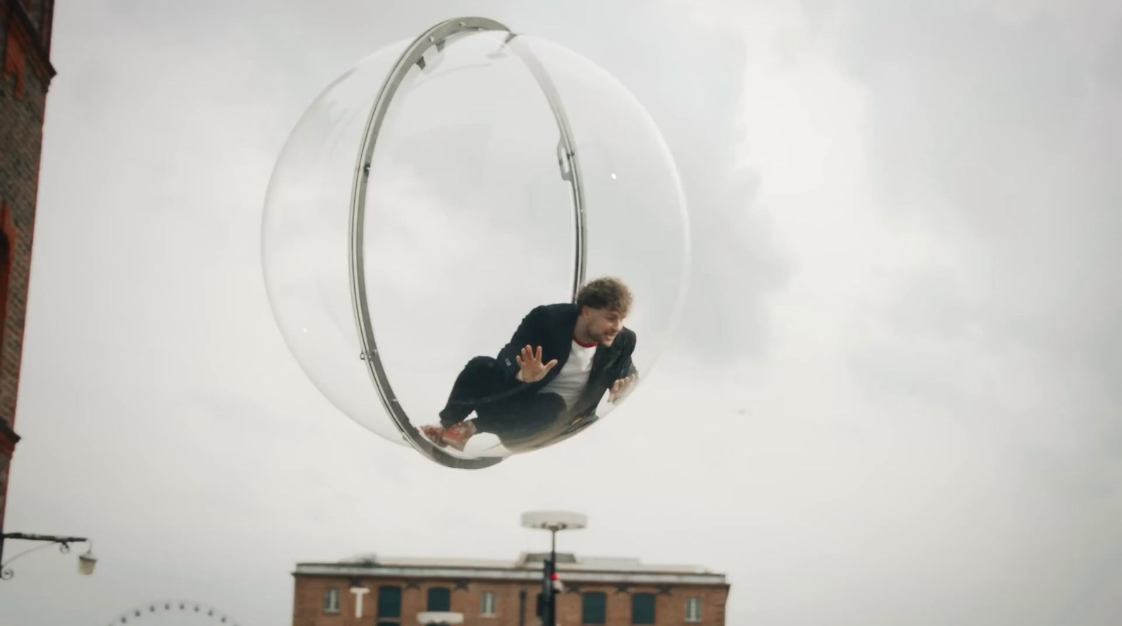 a man flying through the air while riding a skateboard