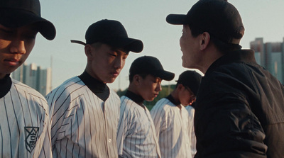 a group of baseball players standing next to each other