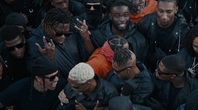 a group of men standing next to each other