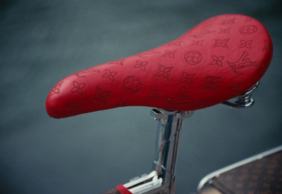 a close up of a red seat on a bike