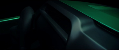 a close up of a car's dashboard in the dark