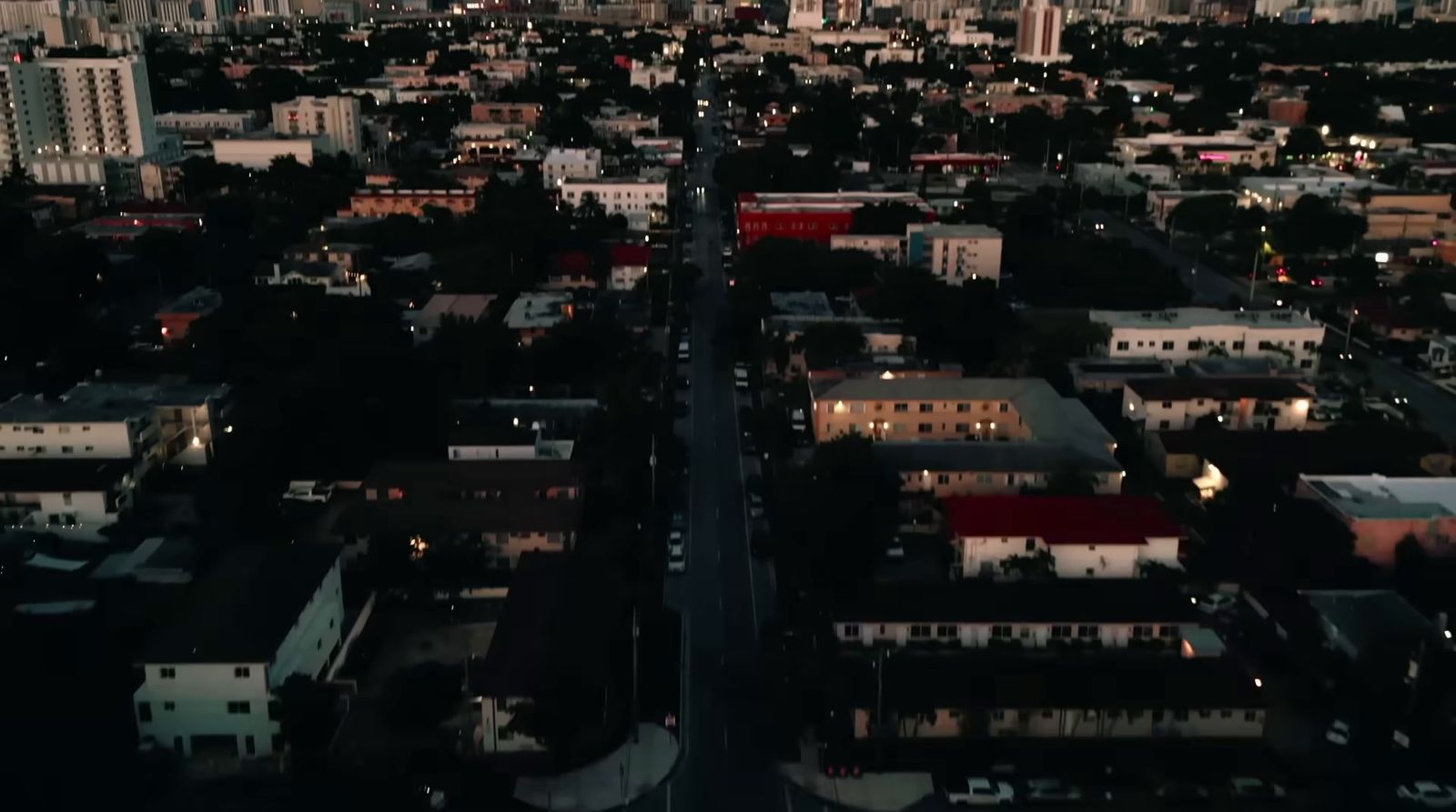 an aerial view of a city at night