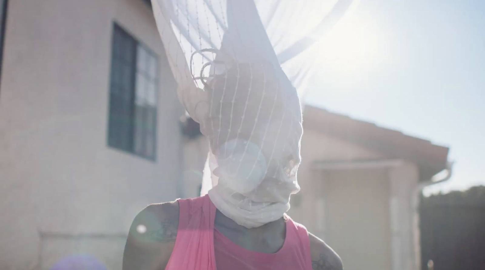 a mannequin with a veil on it's head