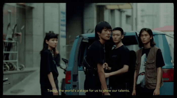 a group of people standing in front of a van