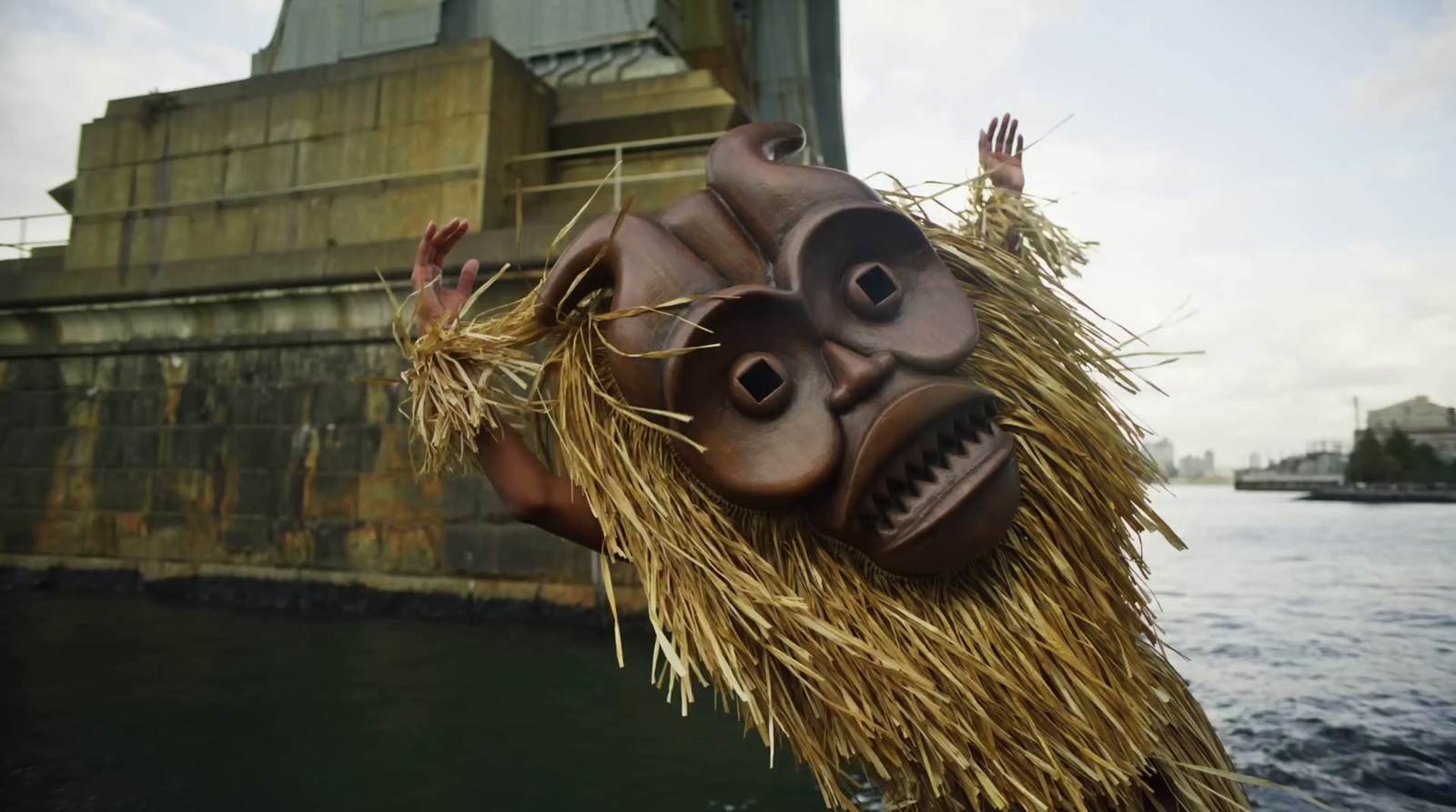 a sculpture of a face made out of straw