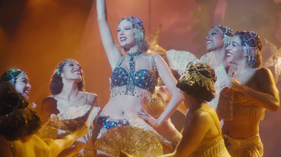 a group of women dressed in belly dance costumes