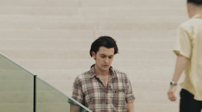 a man walking down a flight of stairs