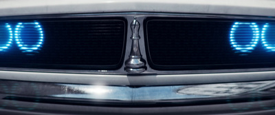 a close up of the headlights of a car