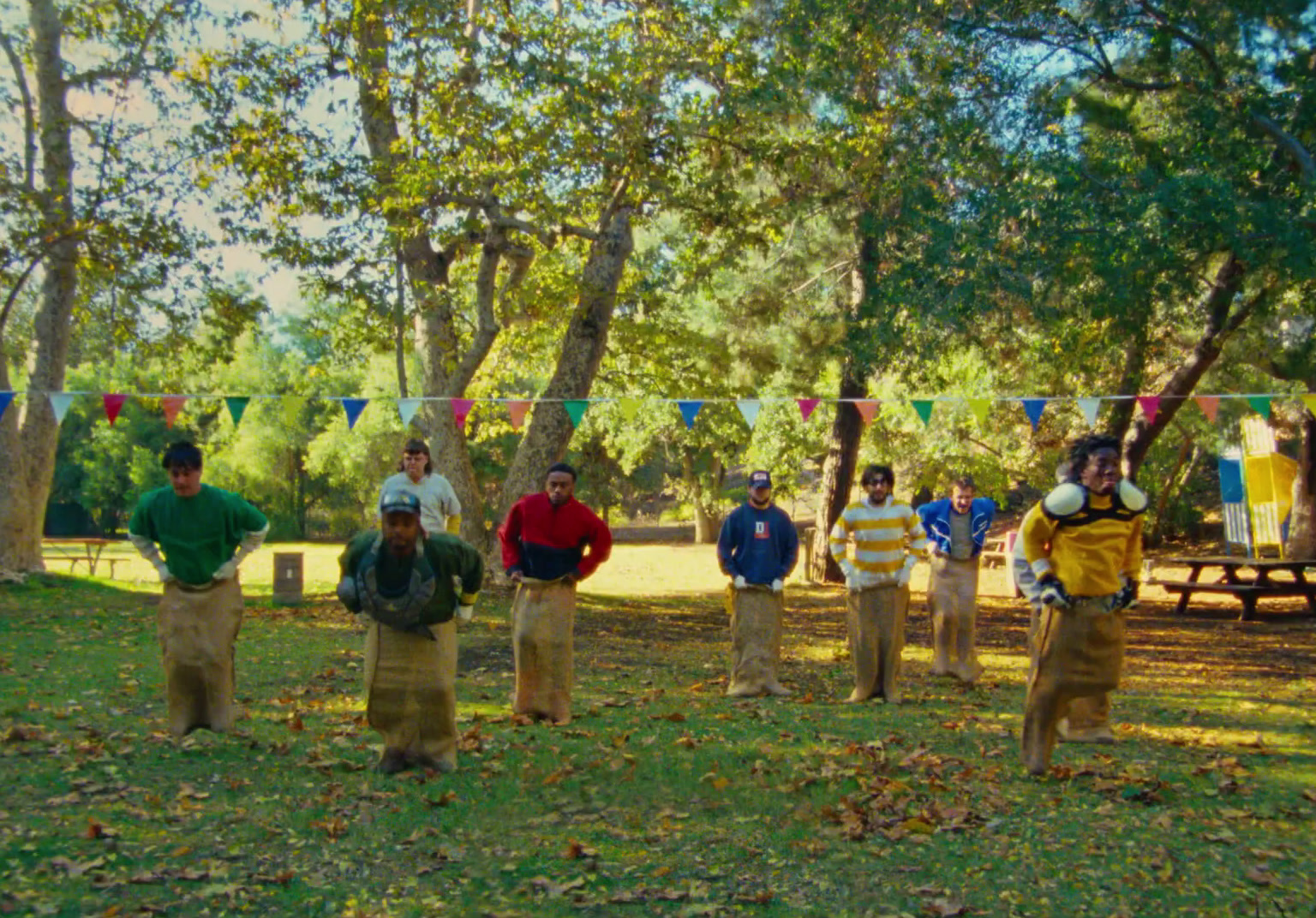 a group of people standing in a park