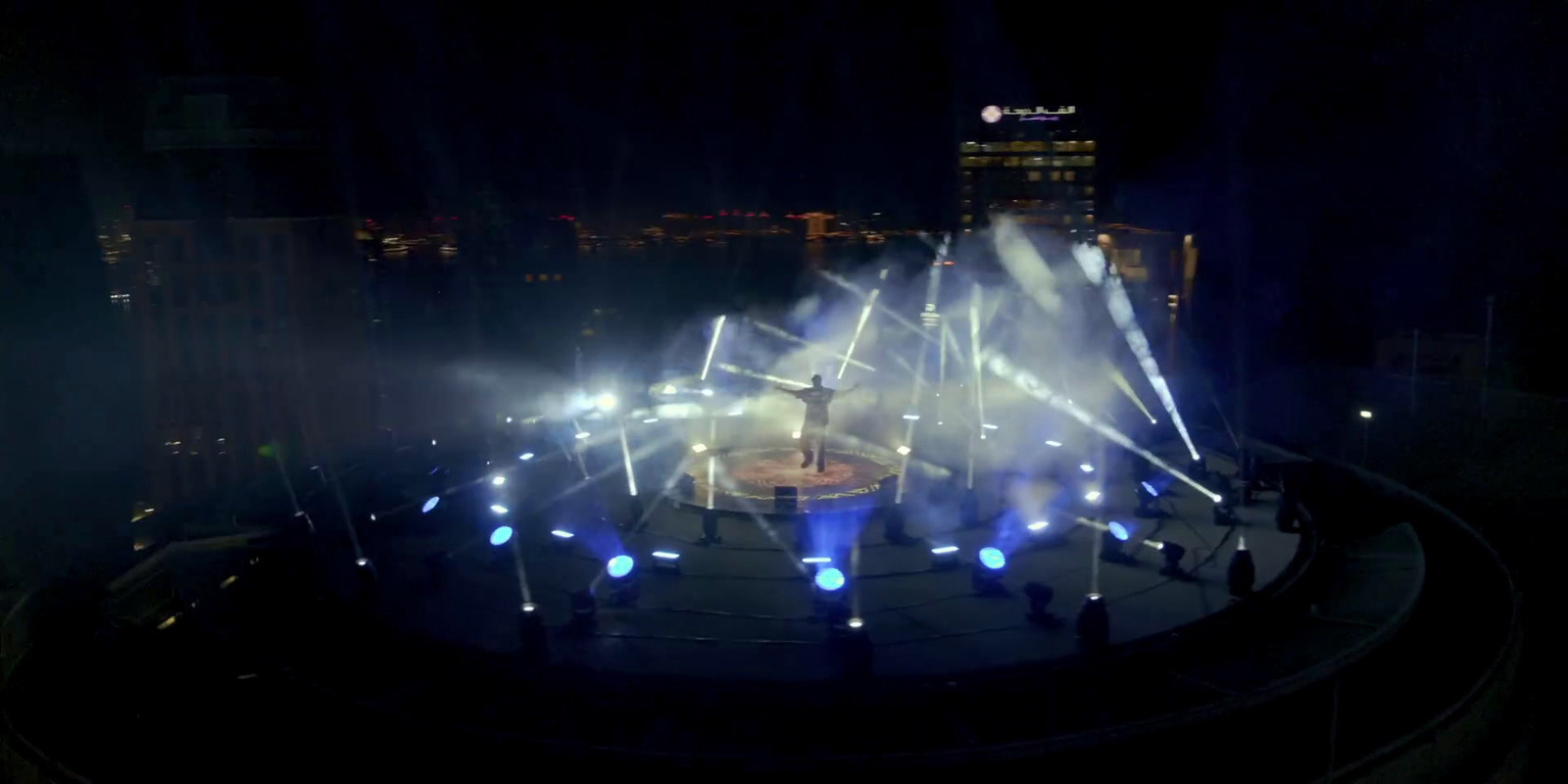 a group of people standing on top of a stage