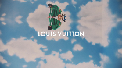 a picture of louis vuitton with a sky background