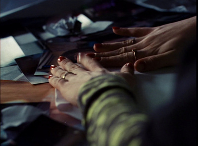 a woman's hands on top of a table