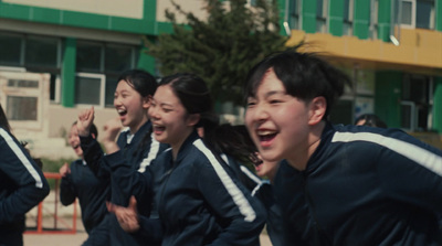 a group of people that are standing in the street