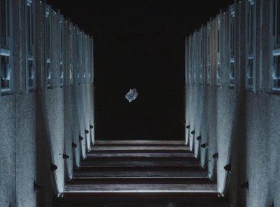 a long set of stairs leading to a dark room