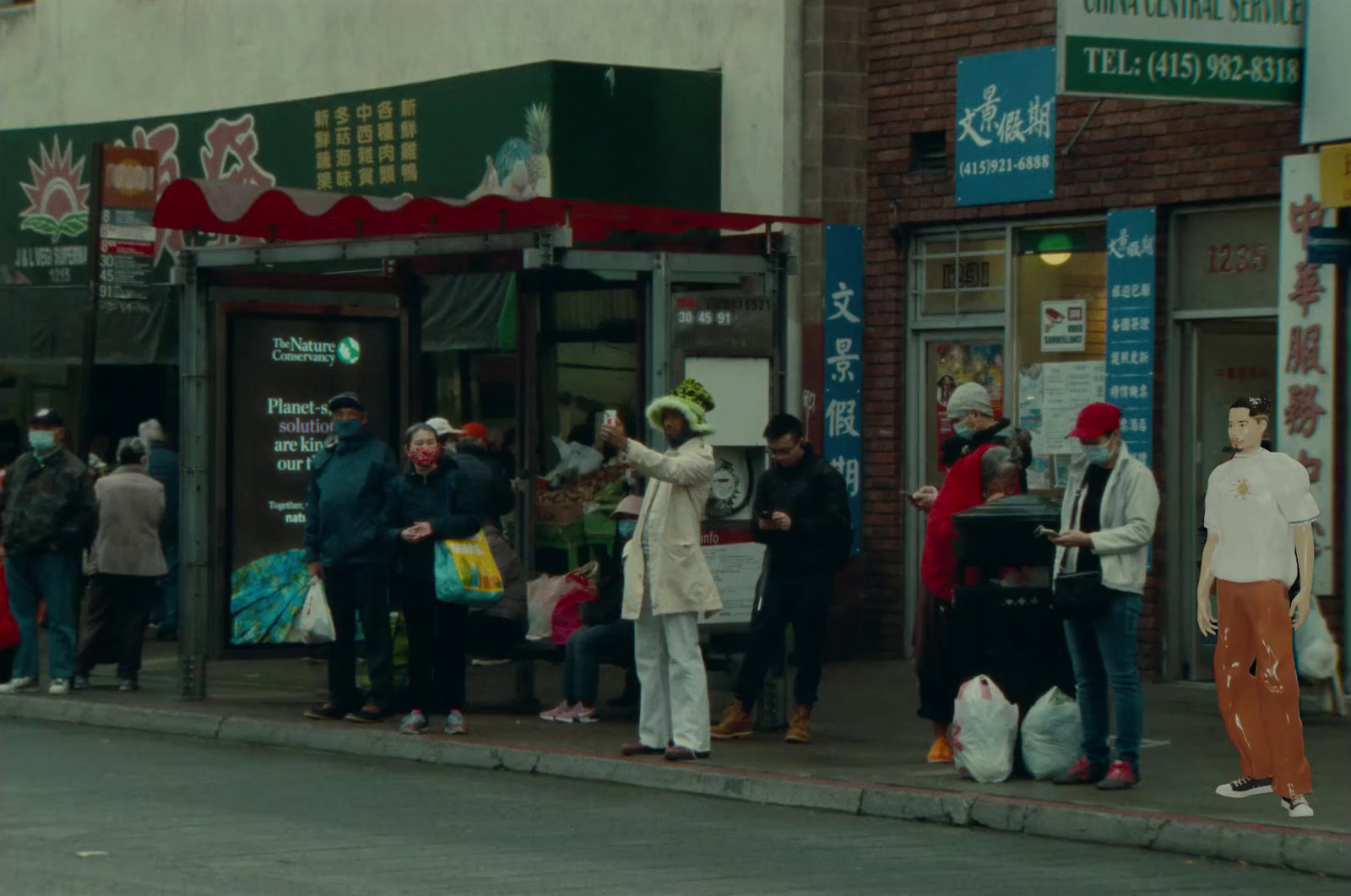 a group of people standing on the side of a street