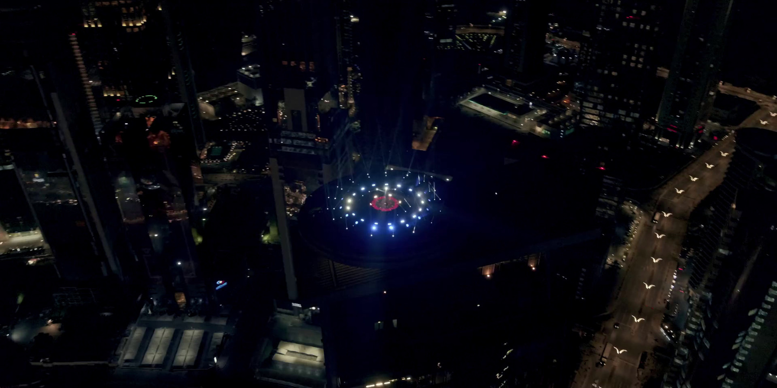 an aerial view of a city at night