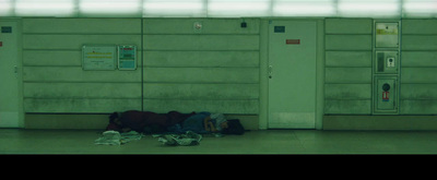 a pile of luggage sitting on the floor next to a wall