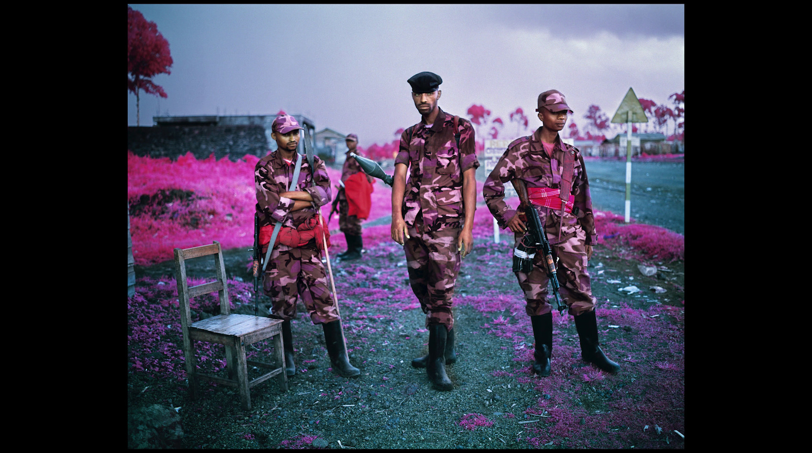 a group of men standing next to each other