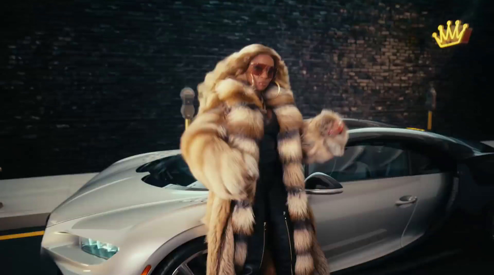 a woman in a fur coat standing next to a car