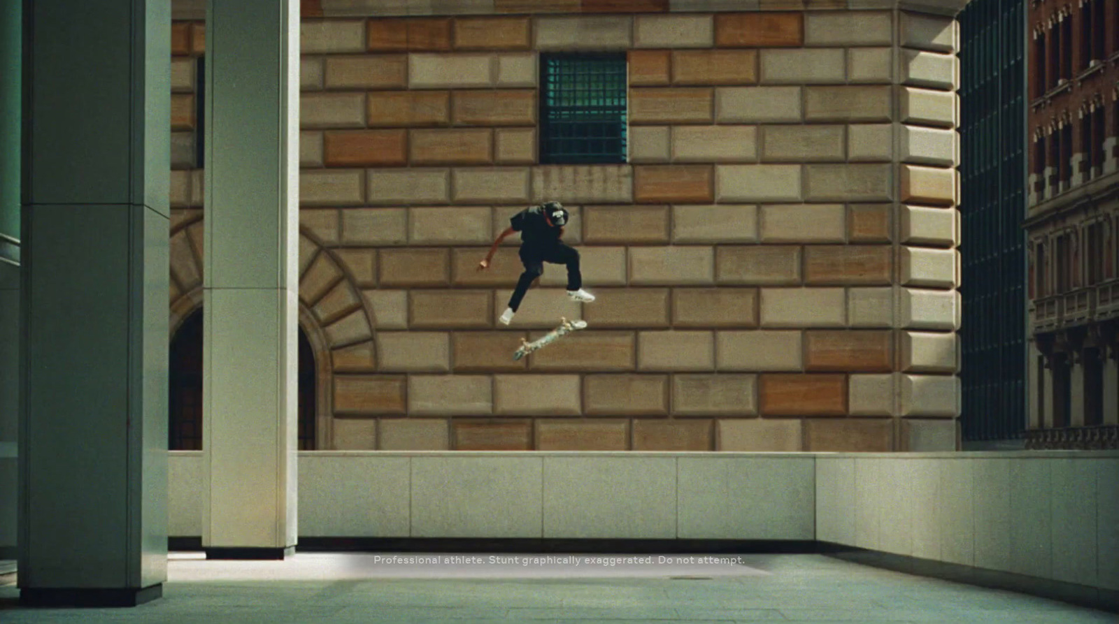 a person jumping in the air on a skateboard