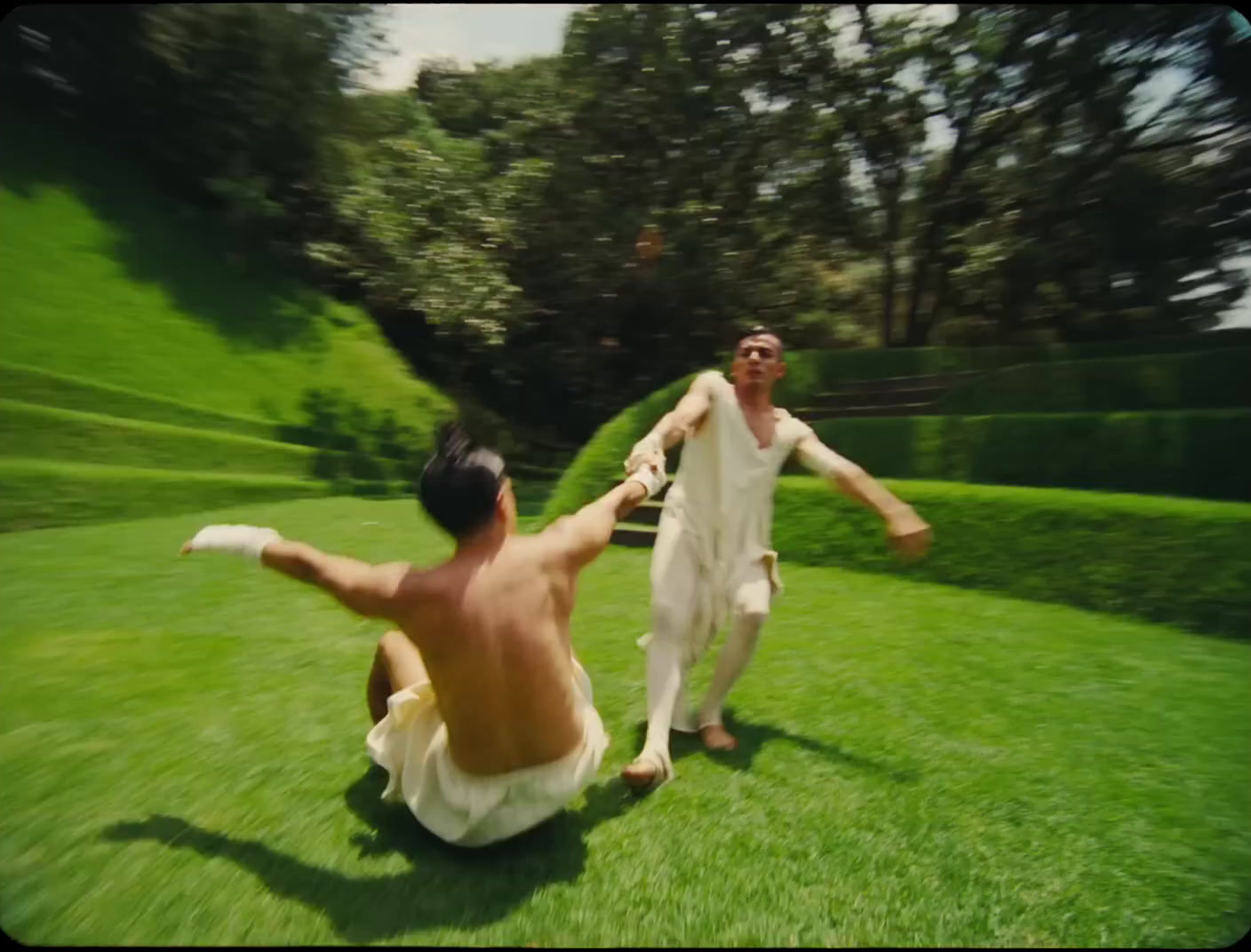 a couple of men playing a game of frisbee