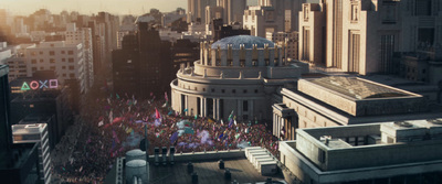 a crowd of people standing on top of a tall building