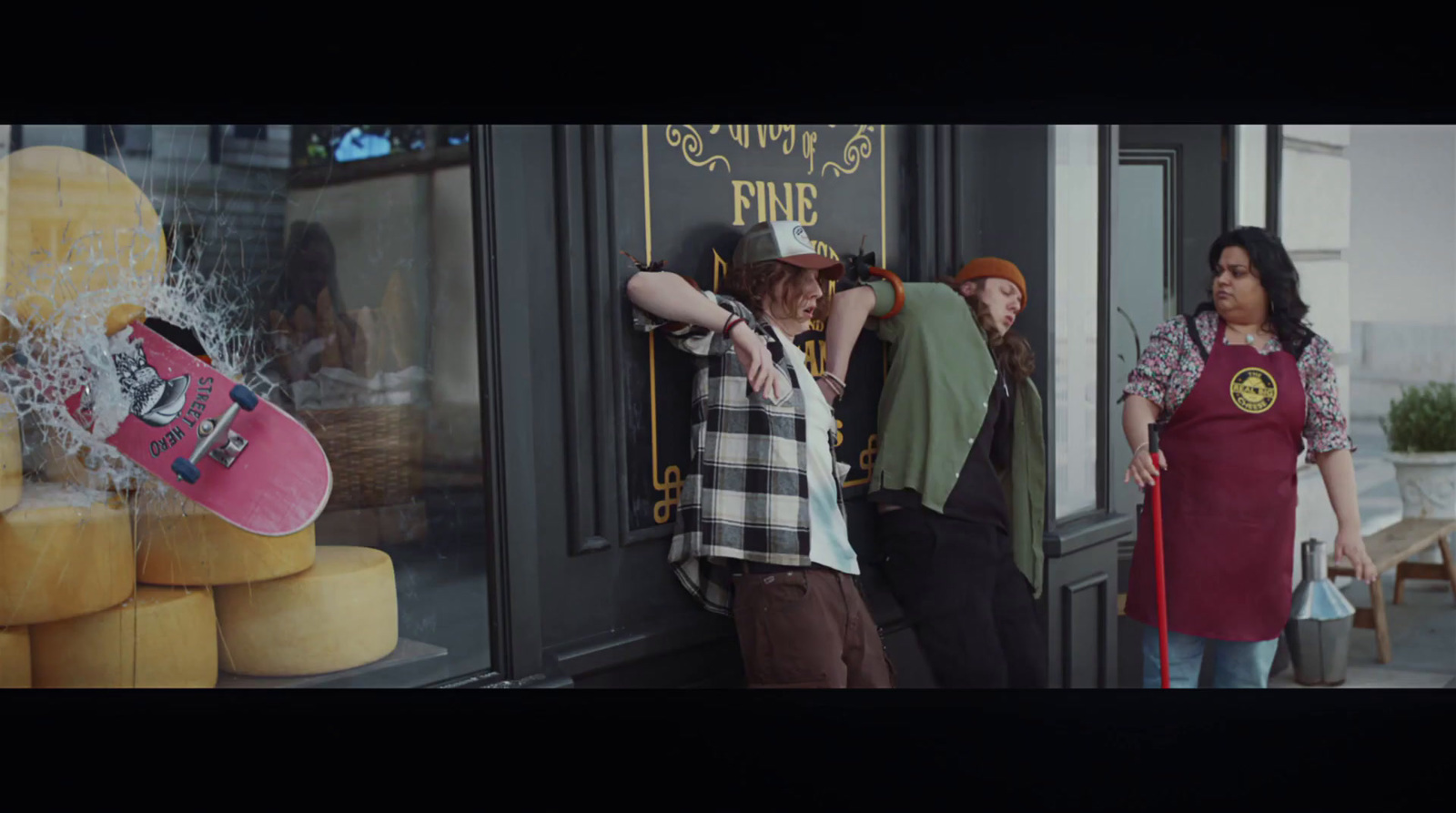 a group of people standing in front of a store