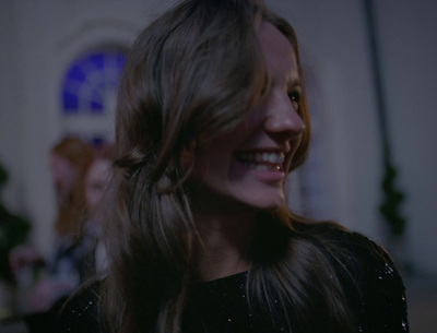 a close up of a person with long hair