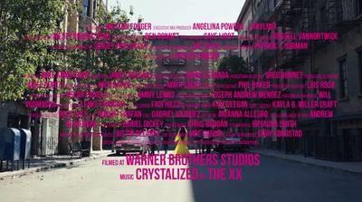 a city street filled with lots of pink text