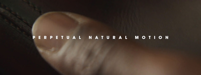 a close up of a person's thumb with the words perpetual natural