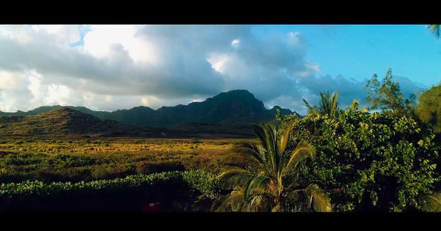 a view of a mountain range from a distance