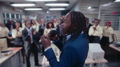 a man standing in front of a group of people